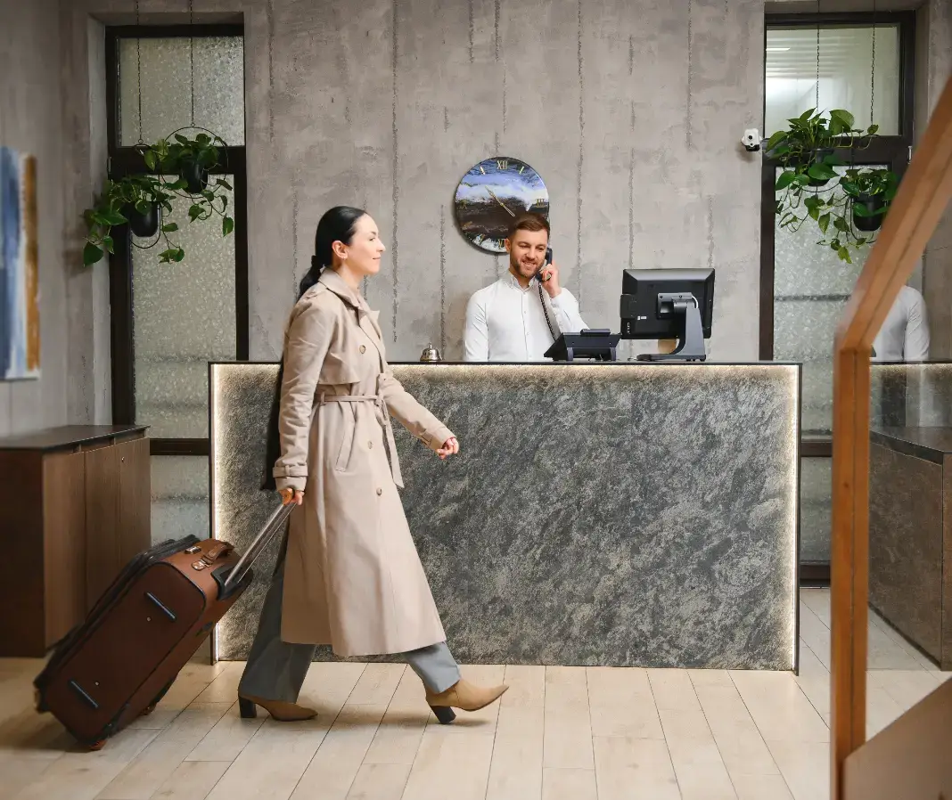 Woman walking in a lobby of a Point Pleasant beach hotel