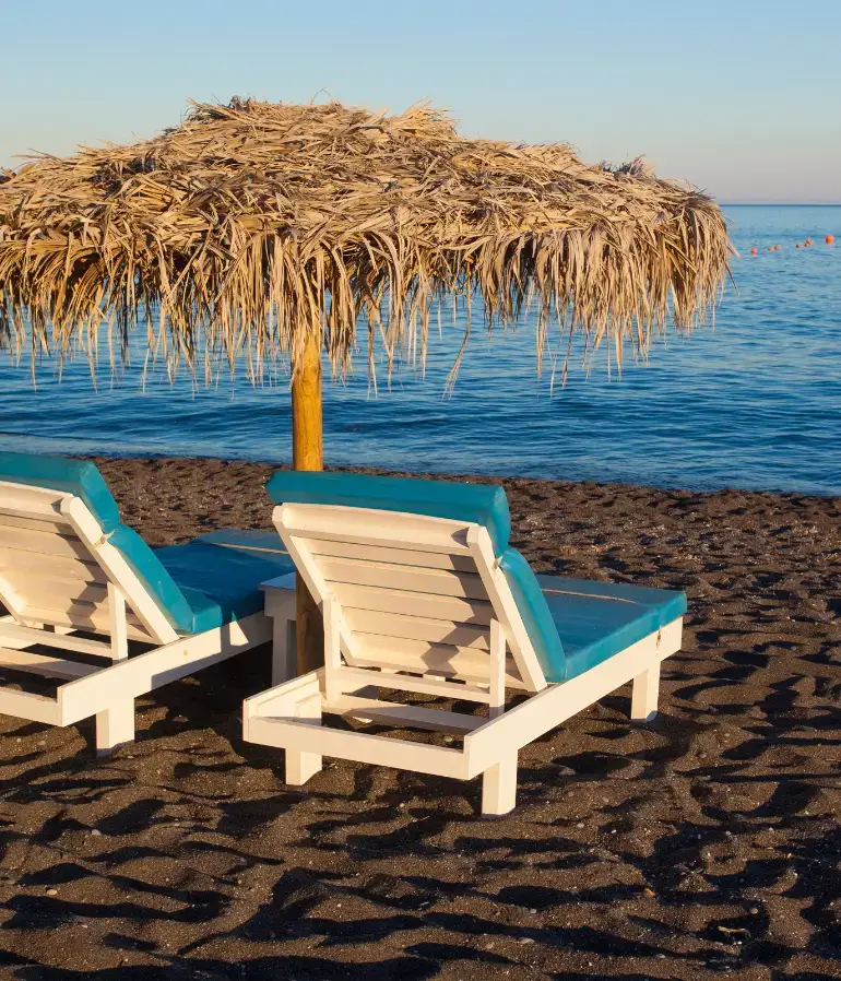 Lounge chairs and umbrella on the beach