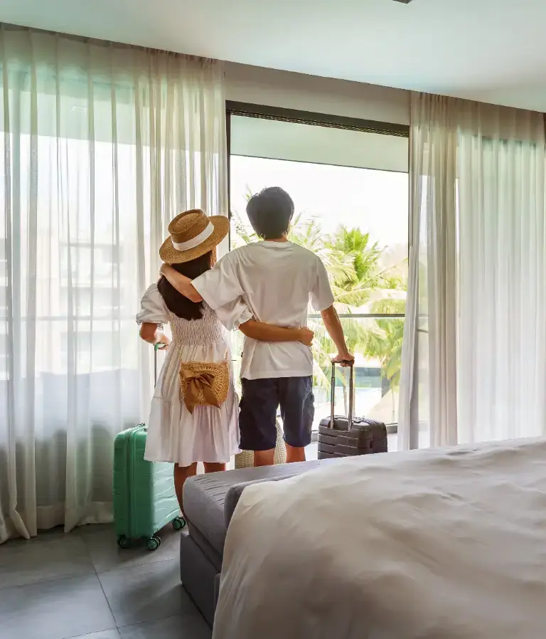 Young couple in a hotel room