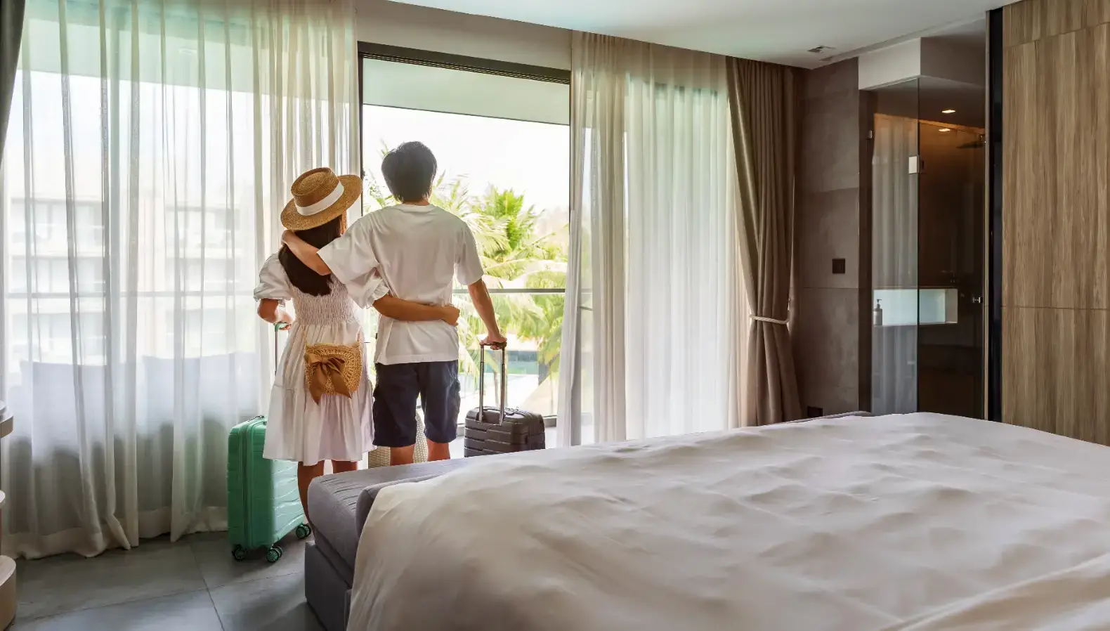 Young couple in a hotel room